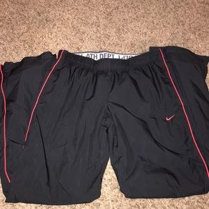 Black Nike windbreaker pants